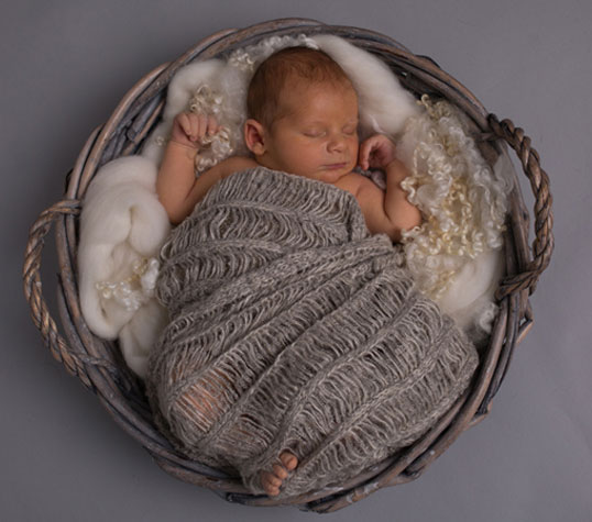 Newborn retouching services: Before.